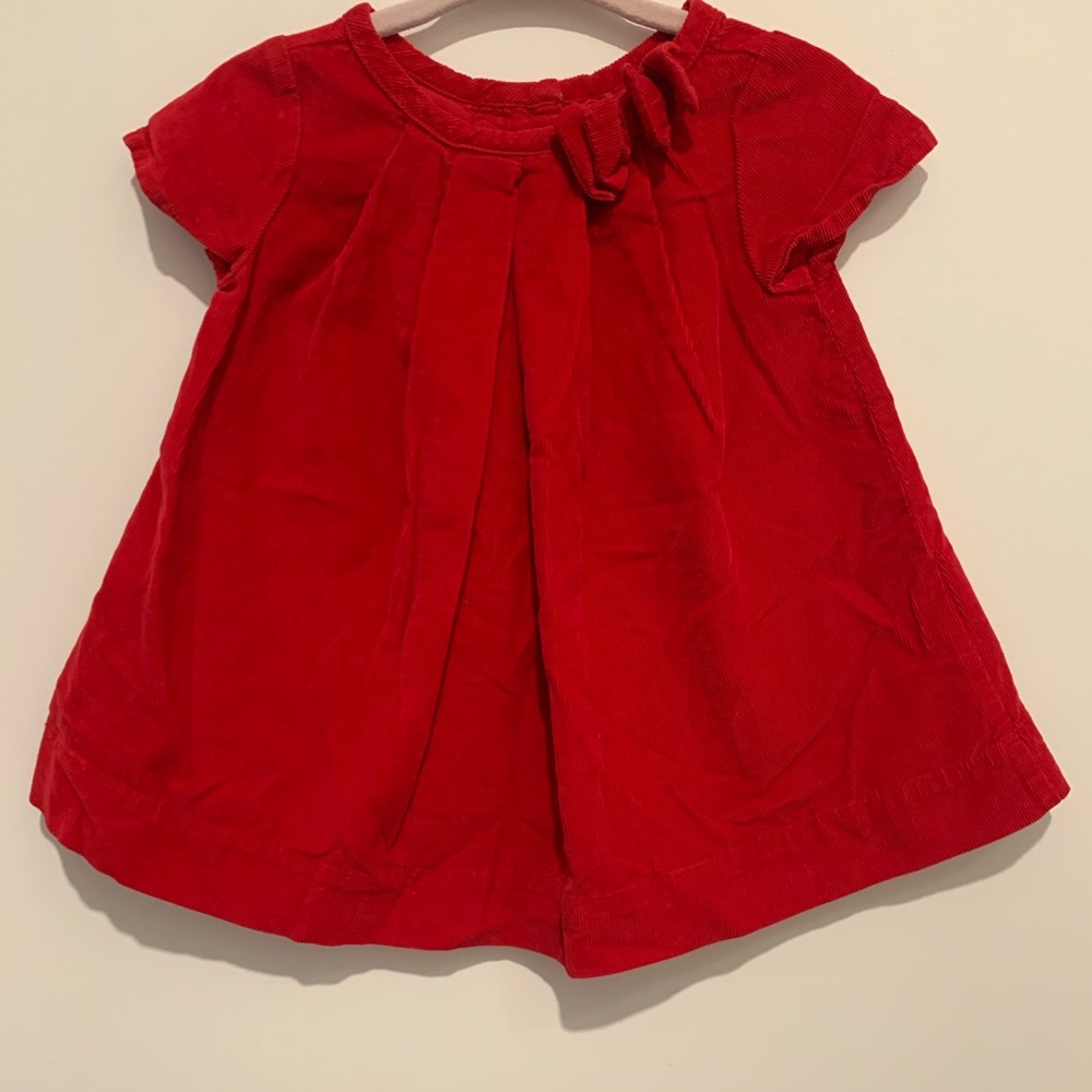 Gap red corduroy dress with bow on front and buttons on back. Size 3-6 months.